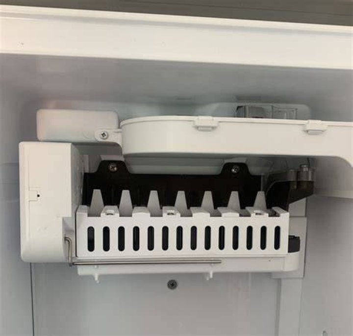 How do I reset my Kenmore ice maker?