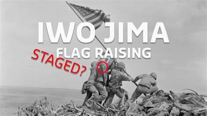 What was the significance of raising the flag on Iwo Jima?
